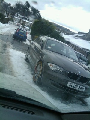 obmw-1-series-with-snow-chains-on-front-wheels-staffordshire-england-dec-2010-photo-by-andy-smith_100334419_m.jpg