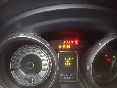 Первый слева во втором ряду.
